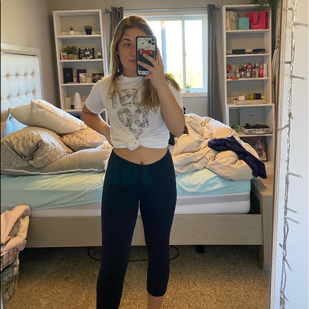 Navy blue Lululemon leggings with mesh